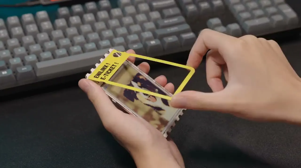 Hands changing the interchangeable yellow faceplate on a TICKEY card