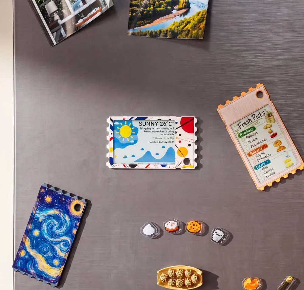 Three TICKEY cards used as colorful notes on a refrigerator